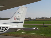N734HZ @ KLVN - Landing Runway 12. - by Mitch Sando