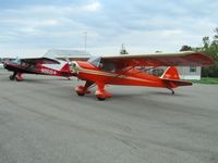 N24332 @ I95 - Mike Lutz's award winning ride on the ramp next to Sam Weaver's N95014 in Kenton, OH - by Bob Simmermon