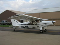 N180MX @ KLVN - Starting up infront of the hangar. - by Mitch Sando