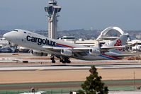 LX-VCV @ LAX - Cargolux LX-VCV departing RWY 25L. - by Dean Heald