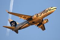 N619AS @ LAX - Alaska Airlines N619AS (FLT ASA597), in nice evening light, climbing out from RWY 24L enroute to Seattle-Tacoma Int'l (KSEA).