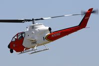 N109Z - US Forest Service Bell 209 N109Z making a low pass at Hansen Dam Park. - by Dean Heald