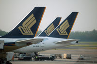 9V-SYE @ WSSS - SIA B777 line-up at Changi - by Micha Lueck