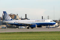 N417UA @ CLE - Cleveland Hopkins Airport - by Howard McGuire II