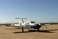 N2168B @ GKY - On the ramp at Arlington Muni - by Zane Adams