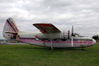 G-RACA @ EGBL - Falling apart: this Sea Prince is now sort of a gate guard at Long Marston, with the Gods Kitchen paint job apparantly the result of a music festival. - by Henk van Capelle
