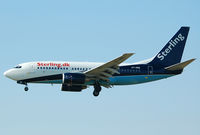 OY-MRE @ LEBL - Sterling on final RWY 25R, ex-Maersk. - by Jorge Molina