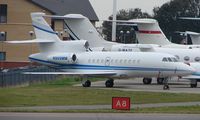 N909MM @ EGGW - on a busy day at Luton Airport (UK) - by Terry Fletcher