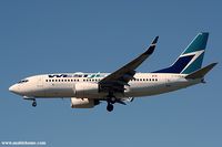 C-FUWS @ CYVR - Westjet flight landing at Vancouver - by Michel Teiten ( www.mablehome.com )