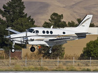 N3066W @ CCR - Dropping left wing at landing on rwy 35R. - by Philippe Bleus