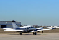 N214GK @ GKY - Taxi out for takeoff.