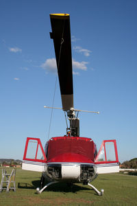 VH-UEE - late afternoon shot of this civi huey-Toowoomba