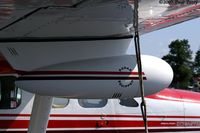 N6LN @ FKN - Weather radar pod under the starboard wing - by Paul Perry