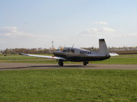 N9154X @ KLVN - Looks identical to Mooney 9153Y. Taxiing to the hangar. - by Mitch Sando