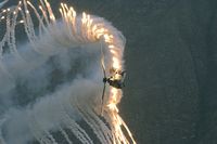 T-341 @ AXALP - Releasing all 128 flares in one go. - by Joop de Groot