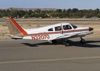 N32070 @ CCR - taxiing alongside rwy 19R/01L. Watch out, this guy just opened the door (and closed it just after that). - by Philippe Bleus