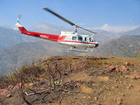 N28HJ - N28HJ On fire Duty at the Day Fire - by E.J. Brooks