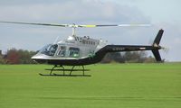 G-BXNT @ EGBK - Jet Ranger landing at Sywell - by Simon Palmer