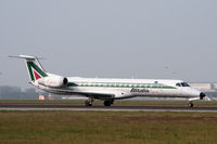 I-EXMU @ LIMC - Alitalia Express Embraer 145 landing at Milan Malpensa - by Steve Hambleton