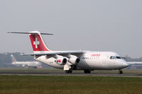 HB-IXP @ LIMC - Swiss Airlines Bae 146 landing at Milan Malpensa - by Steve Hambleton