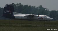 N723FE @ ISO - One of the boneyard birds - by Paul Perry