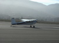 N14PL @ SZP - 1966 Cessna 180H, Continental O-470 230 Hp, landing Rwy 22 in morning haze - by Doug Robertson