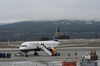 TF-FIA @ YXY - Unloading passengers on the ramp in a light snow. - by Murray Lundberg