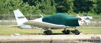 N5129S @ PVG - Still covered, but up near the Aerodyne hangar now.  Awaiting work? - by Paul Perry