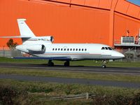 M-FALC @ EGGW - This Falcon was formerly registered HZ-OFC4 and still retains its former colours - by Terry Fletcher