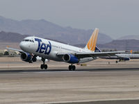 N487UA @ KLAS - Ted Airlines / 2002 Airbus Industrie A320-232 - by Brad Campbell