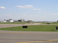 N2132R @ KFCM - Landing Runway 28R. - by Mitch Sando