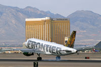 N934FR @ KLAS - Frontier Airlines / 2004 Airbus A319-111 - 'Lynx Cub' - by Brad Campbell