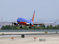 N215WN @ KLAS - Southwest Airlines - 'Ron Chapman - LUV is On-the-Air' / 2005 Boeing 737-7H4 - by Brad Campbell