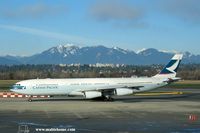 B-HXC @ CYVR - Vancouver mountains in the background : beautiful ! - by Michel Teiten ( www.mablehome.com )