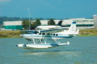 C-FJOE @ CYVR - about to touch down YVR seaplane terminal - by metricbolt