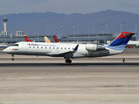 N449SW @ KLAS - Delta Connections - SkyWest / 2002 Bombardier Inc CL-600-2B19 - by Brad Campbell