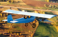 N4716 @ IA27 - Ben Taylor flies his grandfather's Ford model A powered Pietenpol Aircamper near Antique Airfield Balkesburg, IA - by Mike Gretz