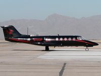 N712DP @ GYR - Snakes alive! Don Prudhomme's beautiful Lear 25. - by John Meneely