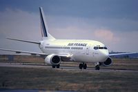 F-GHVM @ LFPG - Air France flight arriving at Terminal 1 before a summer storm - by Michel Teiten ( www.mablehome.com )