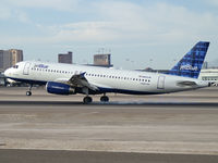 N603JB @ KLAS - jetBlue Airways - 'Viva La Blue' / 2005 Airbus A320-232 - by Brad Campbell