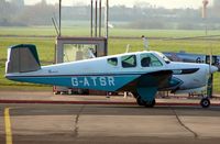 G-ATSR @ EGBJ - 1959 Beech Bonanza at Gloucestershire (Staverton) Airport - by Terry Fletcher