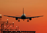 EC-KAX @ LEBL - Vueling Stones over RWY 25R and beautiful sunset. - by Jorge Molina