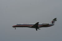 N811AE @ KORD - EMB-135KL