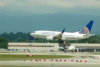 N39728 @ CYVR - Landing at YVR,UPS cargo facility in background.Summer 2007 - by metricbolt