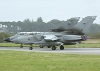 ZA541 @ EGQS - Clear view of the changing colors: one all grey Tornado and one old grey with black dadome and full color squadron markings. - by Joop de Groot