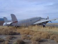 N7249C @ JER - Partially stripped; engines intact. - by Rip Lichliter