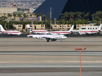 N946FR @ KLAS - Frontier Airlines - 'Perry - the Horned Puffin' / 2006 Airbus A319-111 - by Brad Campbell