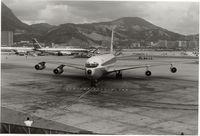 N28728 - Being marshalled into parking spot on ramp,HKG Kai Tak