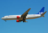 LN-RCN @ LEBL - SAS 738 heavy on final to RWY 25R. - by Jorge Molina