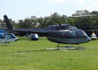 G-BBOR - Helicopters arrive at the temporary Heliport on 2007 Epsom Derby Day (Horse racing) - by Terry Fletcher